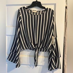 Black and white bell sleeved crop top. Brand new with tags size medium.